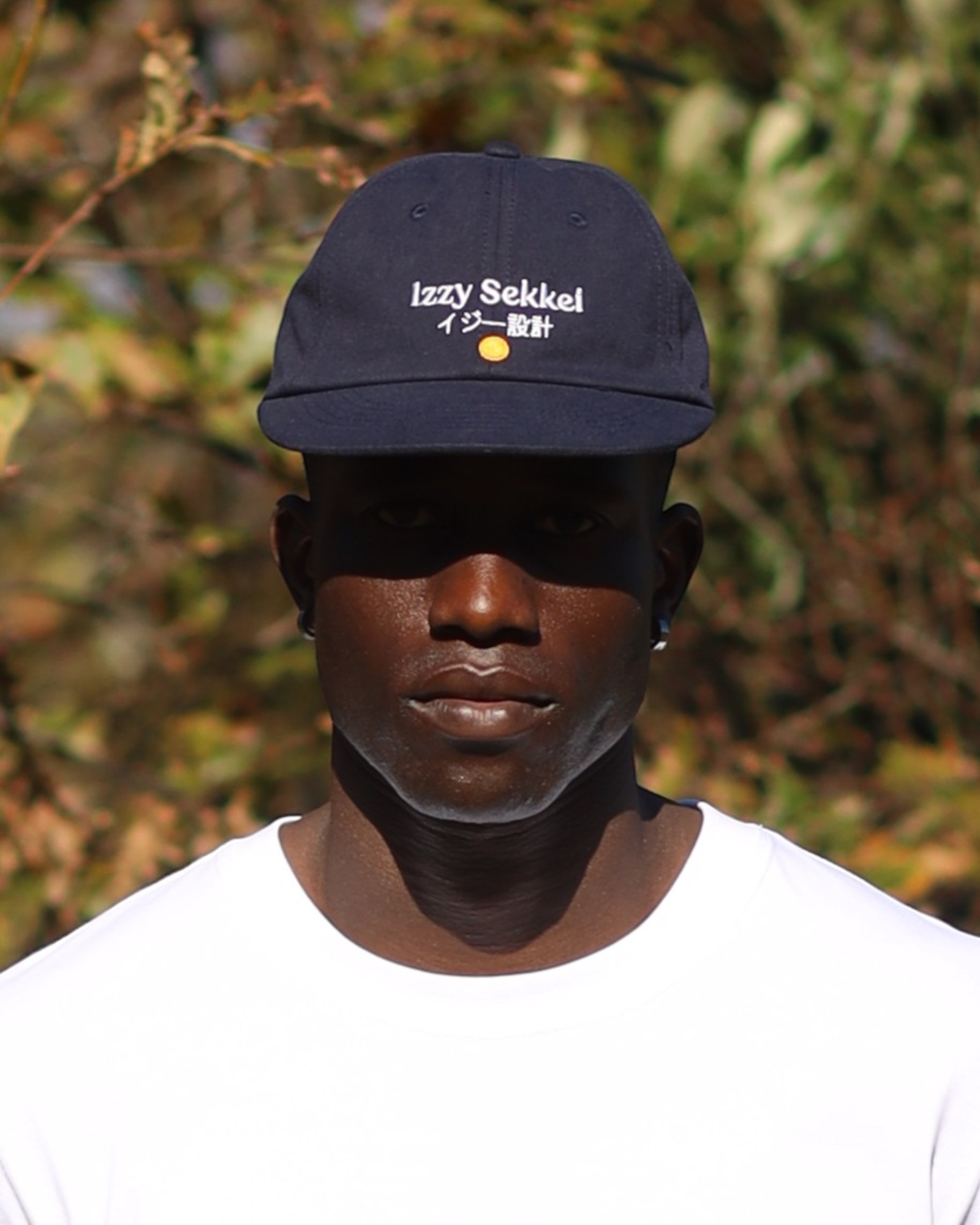 IZZY SEKKEI SHORT PEAK BASEBALL CAP - NAVY