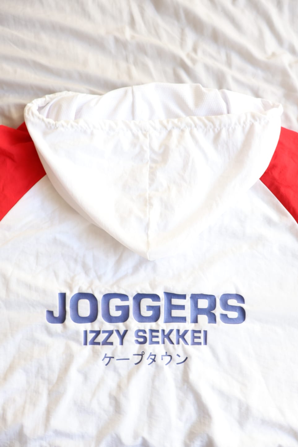 IZZY SEKKEI ZIP UP WINDBREAKER